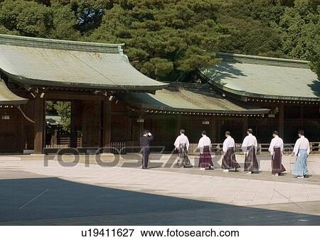 Stock Photo - Building Exterior, Wood, Medium Group Of People, Rear View, Roof, Trees, Day. Fotosearch
