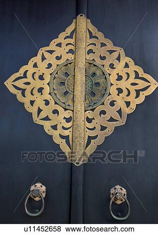 Stock Photo - Day, Door, Door Knocker, Close-up, Hanazono-jinja Shrine, Front Door, Wood. Fotosearch