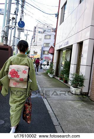 Stock Image - Day, Outdoor, Men. Fotosearch