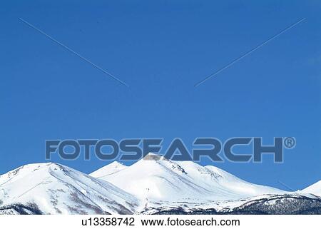 Mountain range covered with snow, Nagano prefecture, Japan, copy space View Large Photo Image Stock Image - Mountain range covered with snow, Nagano prefecture, Japan, copy space. Fotosearch