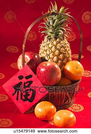 Chinese New Year, Celebrations, Chinese Culture, New Year, Apple, Basket, Citrus Fruit View Large Photo Image Stock Photo - Chinese New Year, Celebrations, Chinese Culture, New Year, Apple, Basket, Citrus Fruit. Fotosearch