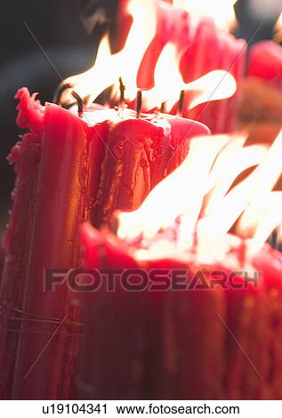 Stock Image - Chinese New Year, Celebrations, New Year, Burning, Candle, Close-Up. Fotosearch