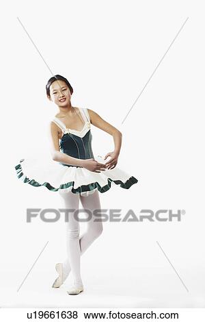 Portrait of a teenage girl performing ballet View Large Photo Image Stock Photo - Portrait of a teenage girl performing ballet. Fotosearch