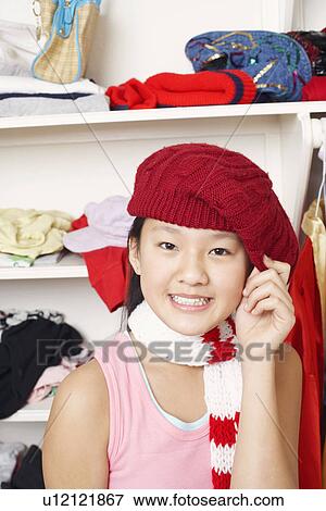 Portrait of a girl wearing a hat View Large Photo Image Stock Photo - Portrait of a girl wearing a hat. Fotosearch