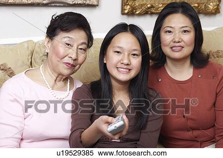 Stock Photography - Portrait of a girl with her mother and her grandmother. Fotosearch