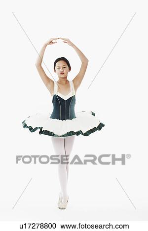 Stock Image - Portrait of a teenage girl performing ballet. Fotosearch