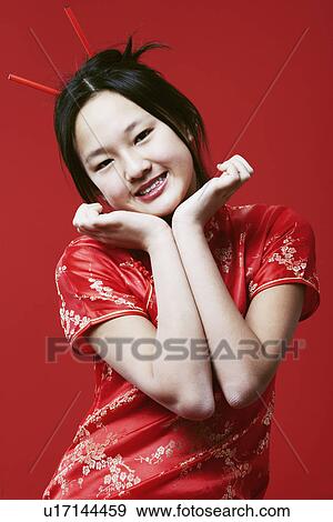 Portrait of a teenage girl smiling View Large Photo Image Stock Photo - Portrait of a teenage girl smiling. Fotosearch