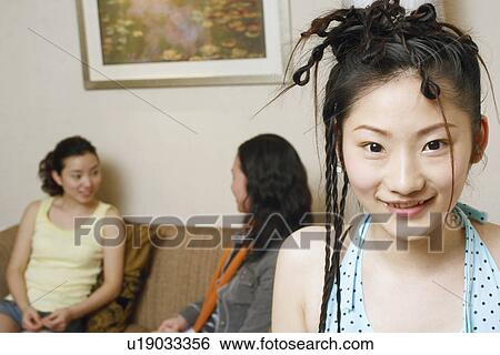 Portrait of a teenage girl smiling View Large Photo Image Stock Photograph - Portrait of a teenage girl smiling. Fotosearch