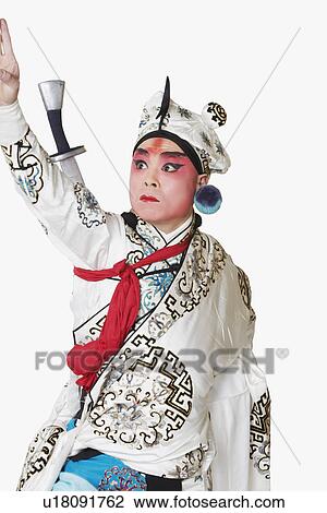 Stock Image - Close-up of a mature man wearing traditional clothing. Fotosearch