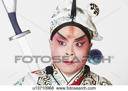 Stock Photo - Close-up of a mature man wearing traditional clothing. Fotosearch