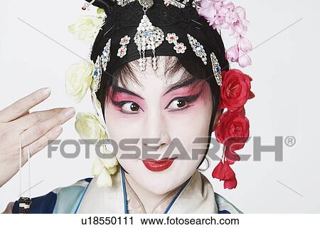 Close-up of a mature woman wearing traditional clothing View Large Photo Image Stock Image - Close-up of a mature woman wearing traditional clothing. Fotosearch