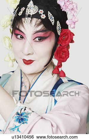 Close-up of a mature woman wearing traditional clothing View Large Photo Image Stock Photograph - Close-up of a mature woman wearing traditional clothing. Fotosearch