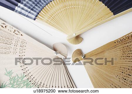 Close-up of three folding fans View Large Photo Image Stock Image - Close-up of three folding fans. Fotosearch