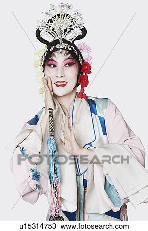 Stock Image - Mature woman wearing traditional clothing. Fotosearch