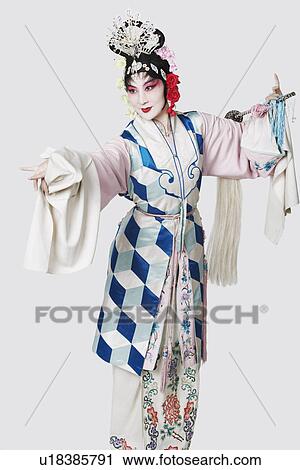 Stock Image - Mature woman wearing traditional clothing. Fotosearch