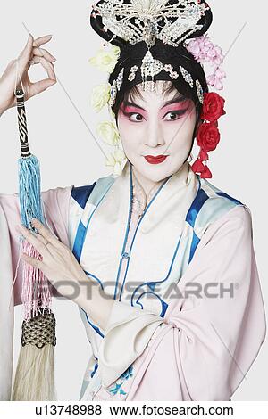 Stock Photo - Mature woman wearing traditional clothing. Fotosearch