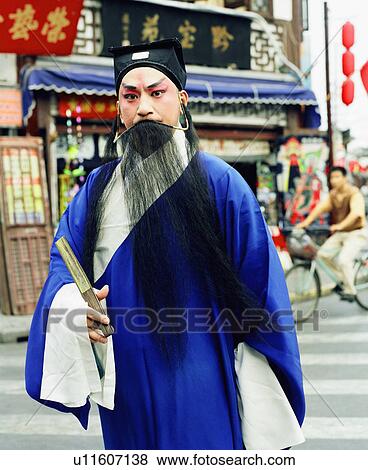 Portrait of a young man dressed in traditional get up View Large Photo Image Stock Photo - Portrait of a young man dressed in traditional get up. Fotosearch