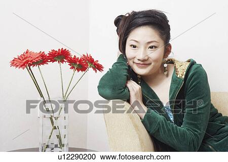 Close-up of a teenage girl smiling View Large Photo Image Stock Image - Close-up of a teenage girl smiling. Fotosearch