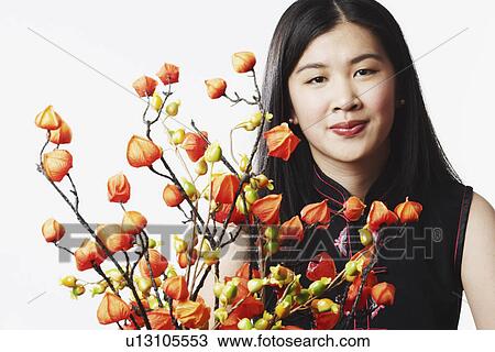 Portrait of a young woman grinning View Large Photo Image Stock Image - Portrait of a young woman grinning. Fotosearch