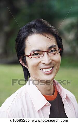 Portrait of a mid adult man smiling View Large Photo Image Stock Photography - Portrait of a mid adult man smiling. Fotosearch