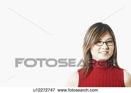 Stock Photo - Portrait of a mid adult woman smiling. Fotosearch