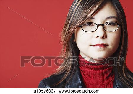 Stock Photo - Portrait of a mid adult woman. Fotosearch