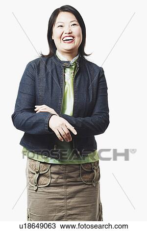 Stock Image - Close-up of a mid adult woman smiling. Fotosearch