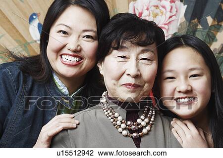 Stock Image - Portrait of a grandmother with her daughter and granddaughter. Fotosearch