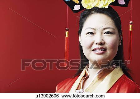 Portrait of a mid adult woman smiling View Large Photo Image Stock Photograph - Portrait of a mid adult woman smiling. Fotosearch