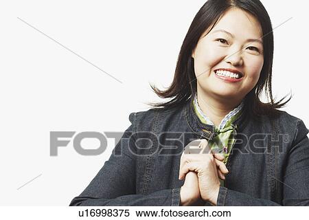 Portrait of a mid adult woman smiling View Large Photo Image Stock Photography - Portrait of a mid adult woman smiling. Fotosearch