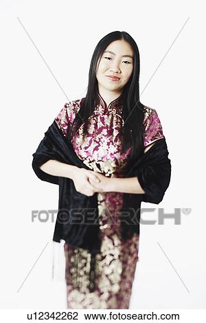 Stock Image - Portrait of a young woman smiling. Fotosearch