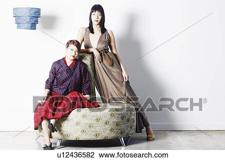 Portrait of two young women View Large Photo Image Stock Image - Portrait of two young women. Fotosearch