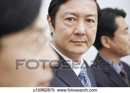 Stock Photography - Portrait of two businessmen. Fotosearch
