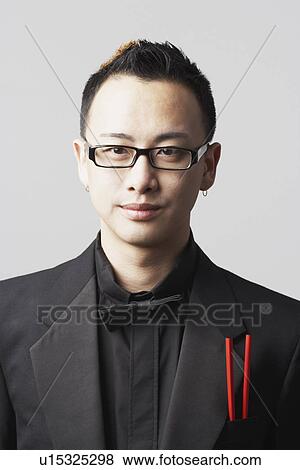 Portrait of a young man thinking View Large Photo Image Stock Photo - Portrait of a young man thinking. Fotosearch