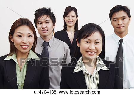 Portrait of three businesswomen and two businessmen smiling View Large Photo Image Stock Photo - Portrait of three businesswomen and two businessmen smiling. Fotosearch