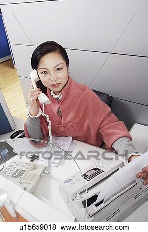Portrait of a mature woman talking on the telephone View Large Photo Image Stock Photo - Portrait of a mature woman talking on the telephone. Fotosearch