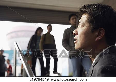 Stock Photo - Close-up of a businessman thinking. Fotosearch
