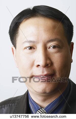 Stock Photograph - Portrait of a mature man smiling. Fotosearch