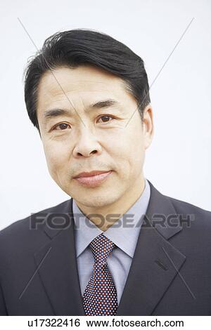 Stock Photograph - Portrait of a businessman. Fotosearch