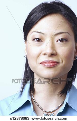 Portrait of a businesswoman smiling View Large Photo Image Stock Image - Portrait of a businesswoman smiling. Fotosearch