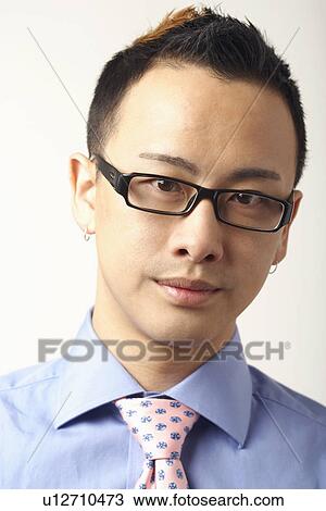 Portrait of a businessman thinking View Large Photo Image Stock Image - Portrait of a businessman thinking. Fotosearch