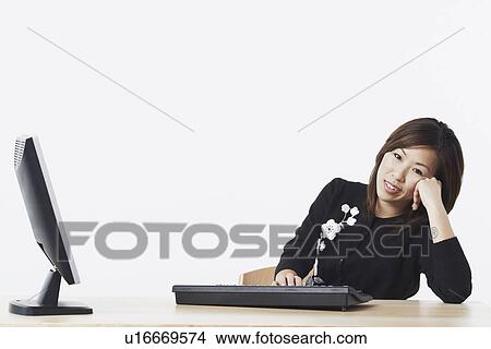 Picture - Portrait of a businesswoman smiling. Fotosearch