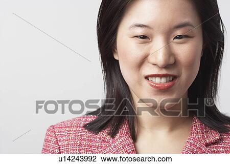 Portrait of a businesswoman smiling View Large Photo Image Stock Image - Portrait of a businesswoman smiling. Fotosearch