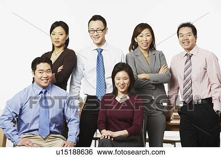 Stock Photograph - Portrait of three businesswomen and three businessmen smiling. Fotosearch