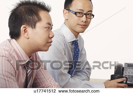 Side profile of two businessmen View Large Photo Image Stock Image - Side profile of two businessmen. Fotosearch