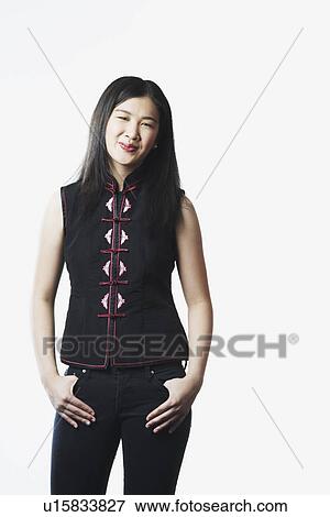 Stock Photo - Portrait of a young woman smiling. Fotosearch