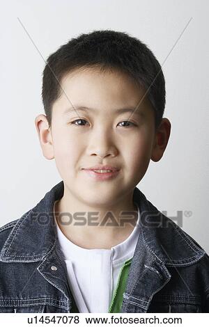 Portrait of a boy smiling View Large Photo Image Stock Photo - Portrait of a boy smiling. Fotosearch