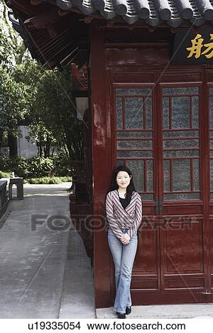 Picture - Portrait of a young woman smiling. Fotosearch