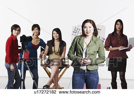 Stock Image - Portrait of five young women smiling. Fotosearch