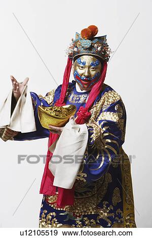 Portrait of a male Chinese opera performer holding a bowl full of gold coins View Large Photo Image Stock Photo - Portrait of a male Chinese opera performer holding a bowl full of gold coins. Fotosearch